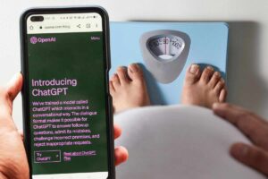 ChatGPT sul cellulare e persona sulla bilancia